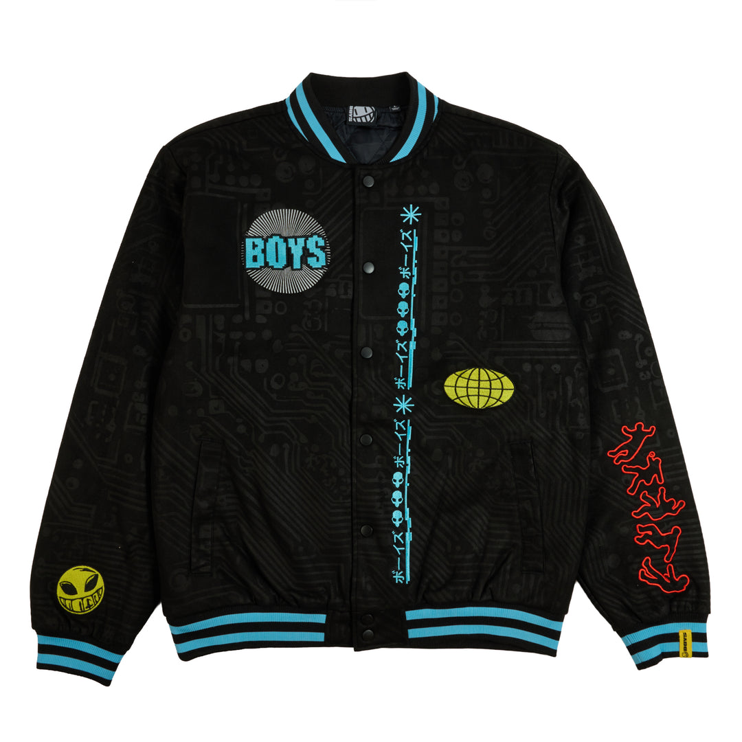 A black varsity-style bomber jacket with a subtle circuit board pattern, featuring light blue ribbed trim, a circular 'BOYS' patch on the chest, a yellow alien graphic on the right sleeve, and red graphic text on the left sleeve.